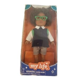 My Life As Mini School Boy doll with curly brown hair and green glasses
